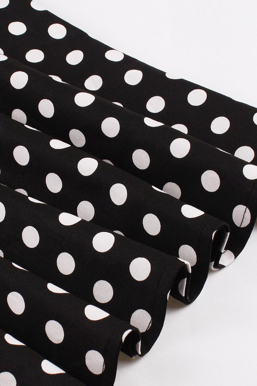 Robe noire à pois style années 50, A-ligne, manches courtes et ceinture